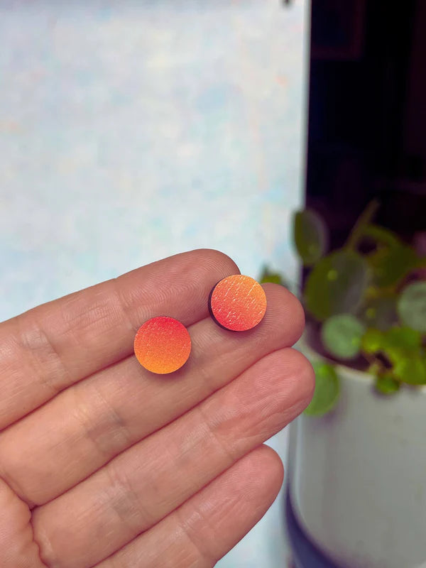 circle studs orange