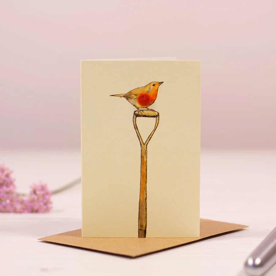 mini robin on a spade